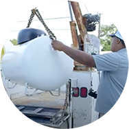 Gibson Oil technician installing a propane tank