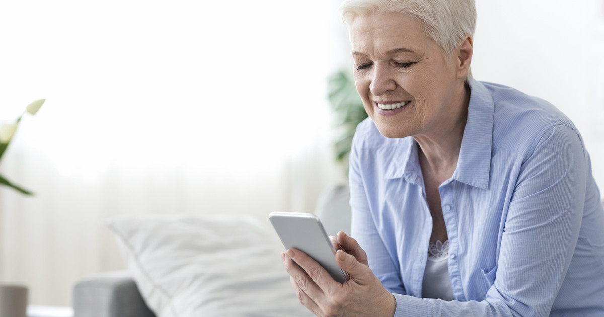 woman holding phone